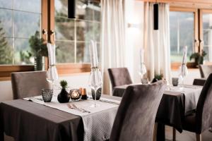 Reštaurácia alebo iné gastronomické zariadenie v ubytovaní Alpinhotel Vajolet - Adults only