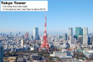 a view of a city with the eiffel tower at MONday Apart Hamamatsucho Daimon in Tokyo