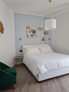 Postel nebo postele na pokoji v ubytování Élite Suite