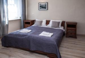 Łóżko lub łóżka w pokoju w obiekcie Pokoje w Kuźnicy u Andrzeja