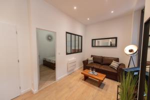 Posedenie v ubytovaní KASA LOFT CENTRE 2 - WIFI et TV - Confortable et stationnement gratuit à proximité