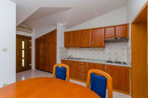Kuchyň nebo kuchyňský kout v ubytování Apartments Milivoj