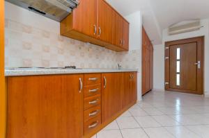 Kuchyň nebo kuchyňský kout v ubytování Apartments Milivoj