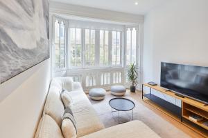 Televízia a/alebo spoločenská miestnosť v ubytovaní Getaria by Basque Homes