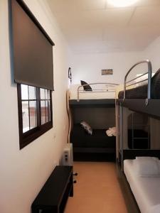 Bunk bed o mga bunk bed sa kuwarto sa Caño de Hierro