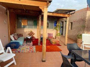 Area soggiorno di Riad La Rose Des Sables