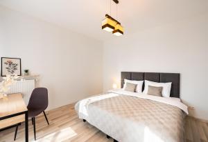 Posteľ alebo postele v izbe v ubytovaní Praga Delightful Apartment