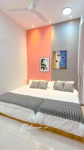 מיטה או מיטות בחדר ב-M Cozy Homestay