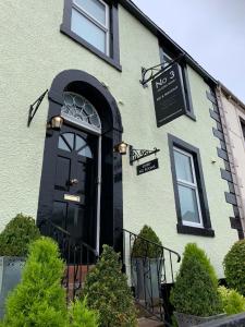 a front door of a house with a black door at No 3 in Penrith