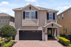 a large house with a garage at 371 P Luxury Villa- New Listing in Orlando