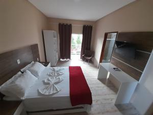 TV a/nebo společenská místnost v ubytování Hotel São Francisco