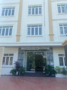 a building with the entrance to the research center for research at Trung Đức Hotel in Hòn Một