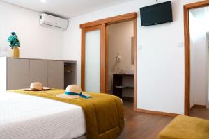 Cama ou camas em um quarto em Quinta de Requeixo
