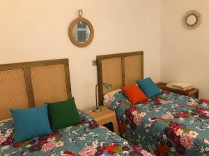 Posteľ alebo postele v izbe v ubytovaní ABA Tropical & ABA Suite