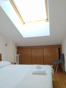 Postel nebo postele na pokoji v ubytování Apartamento Acontecer, a pie del camino de Santiago