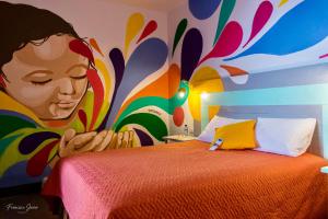 Ein Bett oder Betten in einem Zimmer der Unterkunft Hotel y Arte Antigua