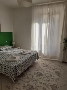 Posteľ alebo postele v izbe v ubytovaní Simone's Scala House
