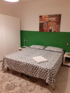Posteľ alebo postele v izbe v ubytovaní Simone's Scala House