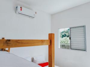 Ein Etagenbett oder Etagenbetten in einem Zimmer der Unterkunft Pousada Eco Beach