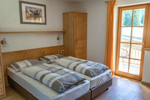 Posteľ alebo postele v izbe v ubytovaní Apartements Precalalt