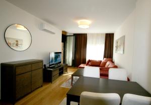 TV a/nebo společenská místnost v ubytování Apartment Iva