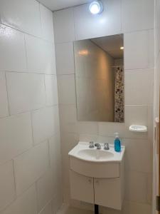 Kupatilo u objektu La Tranquera Apartamentos