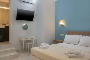 Fotografia z galérie ubytovania Kyma sea front - Apollon Lux apartment v destinácii Kolimvárion