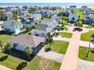 an aerial view of a residential neighborhood with houses at Relax at our Beach Haven - Pet Friendly in Galveston