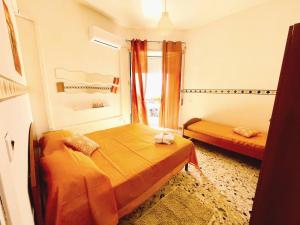 Postel nebo postele na pokoji v ubytování Scauri Holiday
