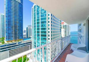 a balcony with a view of a city skyline at Exquisite Ocean View 3 BR Apartment in Miami