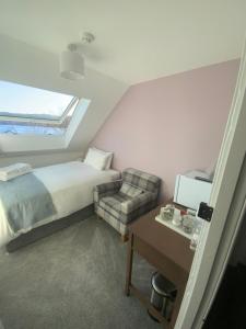 Postel nebo postele na pokoji v ubytování Kilmory House + 10 fotografií