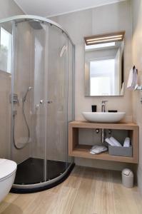 a bathroom with a shower and a sink at Villa Bella Vista 2 in Ičići +29 photos