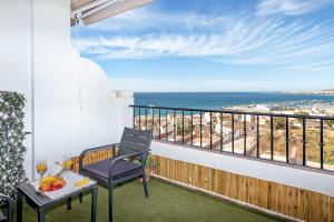 A balcony or terrace at Sunshine Balcony- La Caleta