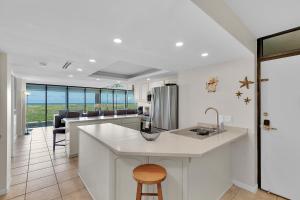 a kitchen with a sink and a counter top at Sea Vista in South Padre Island
