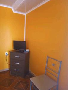 Televízia a/alebo spoločenská miestnosť v ubytovaní Departamento interior, La Serena