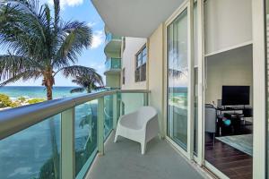 an apartment balcony with a view of the ocean at THE TIDES 1bedroom apt 4th floor WE ARE ON THE BEACH! in Hollywood