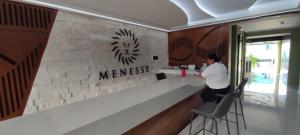 a person standing at a counter in a restaurant at Menesse mitdtown2 , AVE 25TH in Playa del Carmen +66 photos