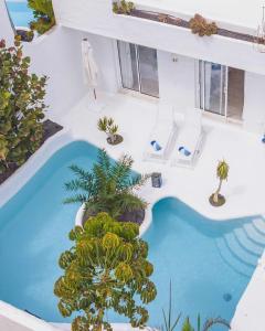 Bazén v ubytovaní Villa Guajara Piscina Climatiz Jacuzzi Villa 714 alebo v jeho blízkosti