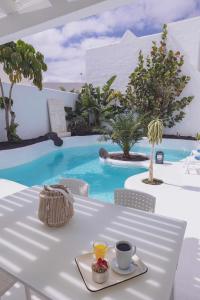 Bazén v ubytovaní Villa Guajara Piscina Climatiz Jacuzzi Villa 714 alebo v jeho blízkosti