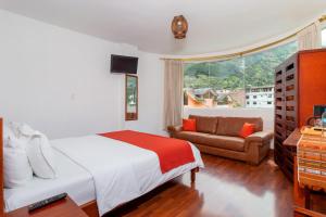 Postel nebo postele na pokoji v ubytování Napolitano Apart Hotel