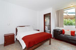 Postel nebo postele na pokoji v ubytování Napolitano Apart Hotel
