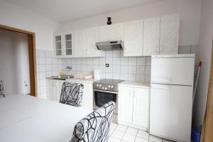 Kuchyň nebo kuchyňský kout v ubytování Apartment Opatija 7904a