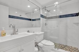 a bathroom with a shower and a toilet and a sink at THE TIDES 2bedrooms apt 14th floor WE ARE ON THE BEACH! in Hollywood
