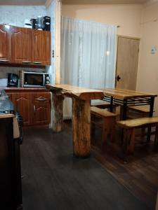 Kuchyň nebo kuchyňský kout v ubytování Cabaña hostal Ema