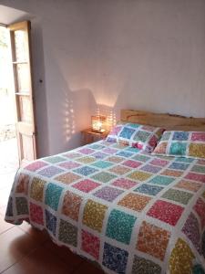 Postel nebo postele na pokoji v ubytování Cabaña hostal Ema