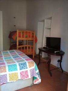 Postel nebo postele na pokoji v ubytování Cabaña hostal Ema