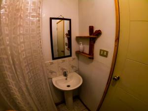 Koupelna v ubytování Cabaña hostal Ema