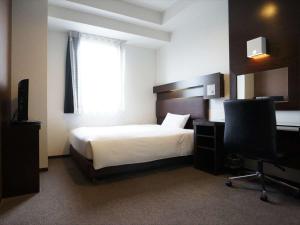 Postel nebo postele na pokoji v ubytování Green Rich Hotel Osaka Airport + 37 fotografií