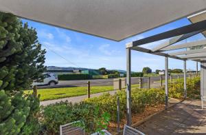 a view of a street with a car driving down a road at Apollo Blue Ocean View Unit 1-A Free WIFI in Apollo Bay