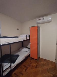 Soul Hostel Av Paulista Bela Vista 2客房内的一张或多张床位
